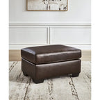 Pouf imbottito con ripiano in pelle e lati in similpelle