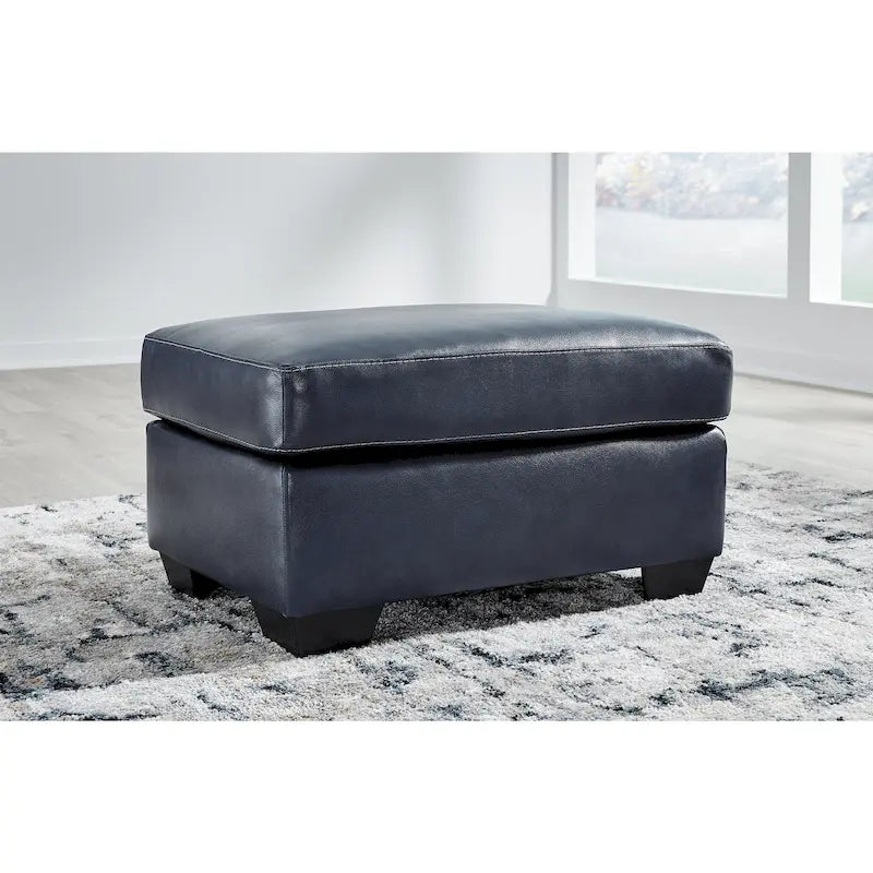 Pouf imbottito con ripiano in pelle e lati in similpelle