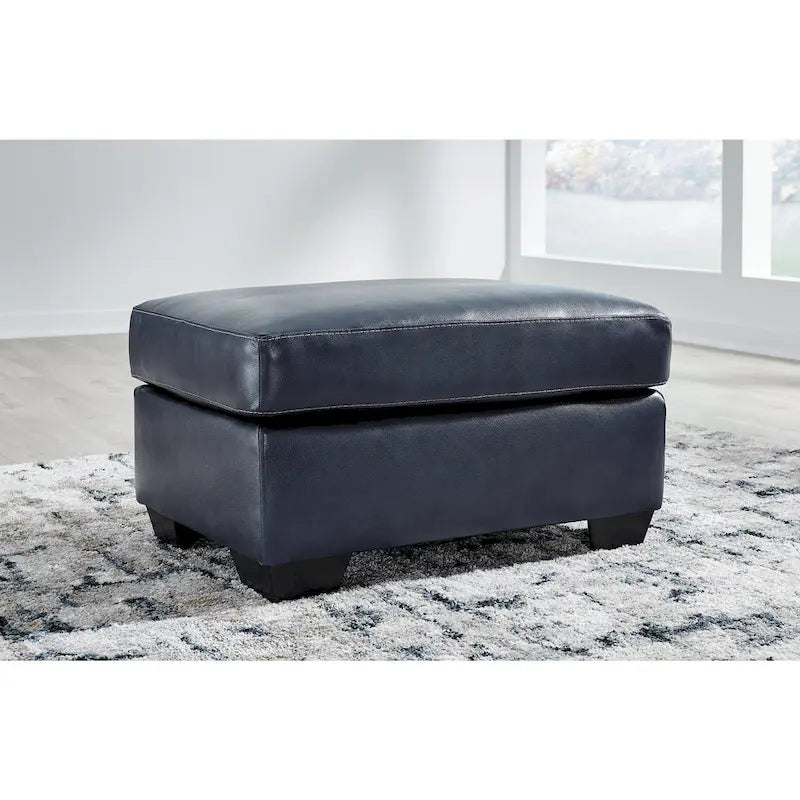 Pouf imbottito con ripiano in pelle e lati in similpelle