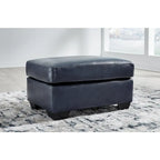 Pouf imbottito con ripiano in pelle e lati in similpelle