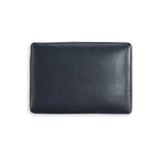 Pouf imbottito con ripiano in pelle e lati in similpelle
